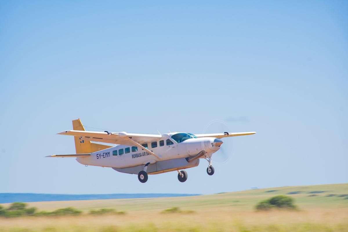 Safari aircraft over savanna